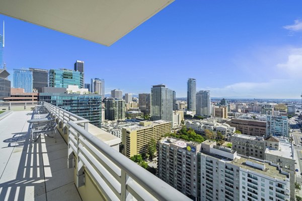 Rooftop deck with skyline views at 717 Olympic Apartments