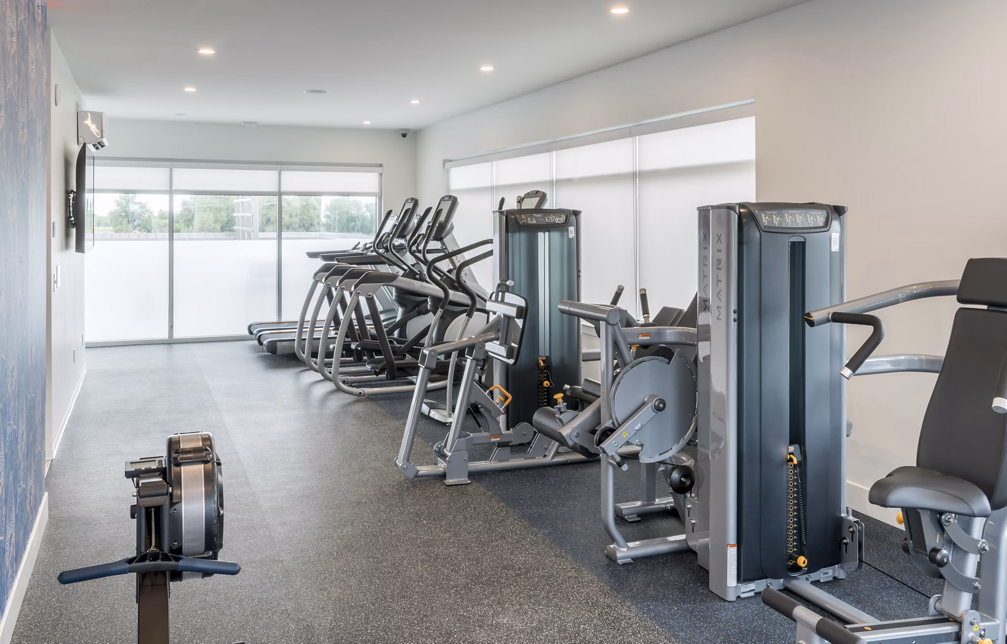 Fitness center featuring modern equipment at Alexan Diagonal Crossing Apartments