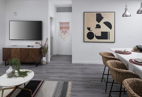Modern hallway with stylish lighting at Alexan Diagonal Crossing Apartments