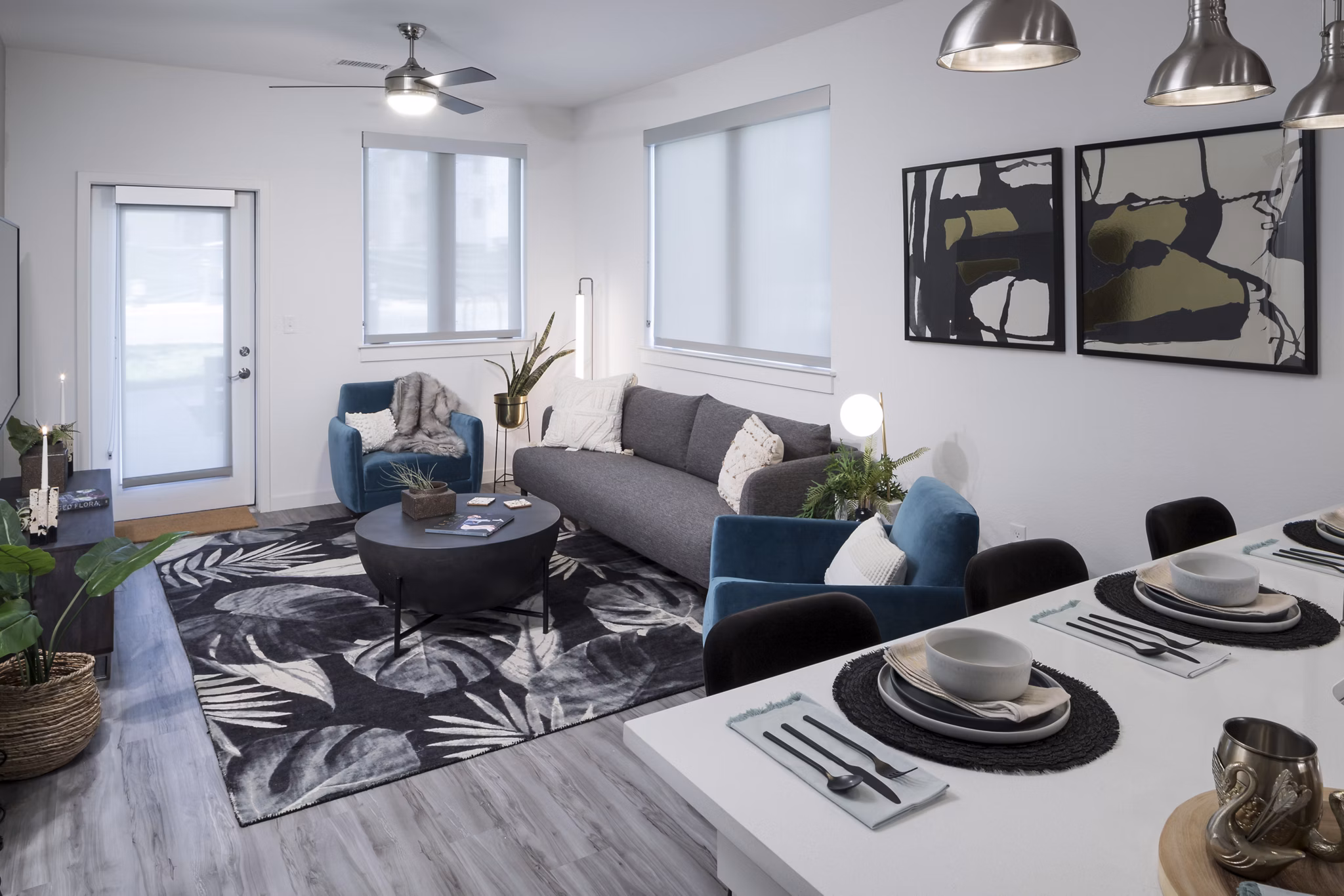 Spacious living room with minimalist design in Alexan Diagonal Crossing Apartments