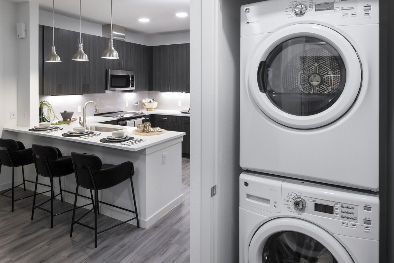 Laundry room at Mysa At The Crossing