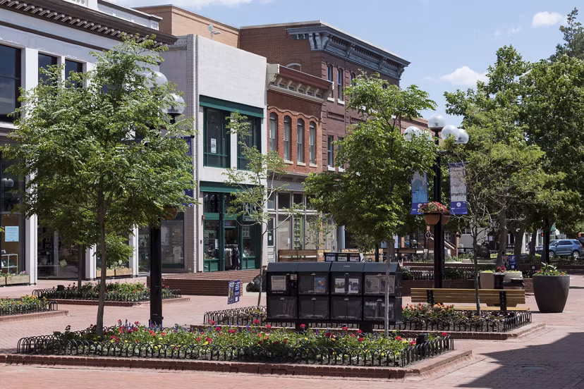 Scenic streetscape in lively neighborhood of Alexan Diagonal Crossing Apartments