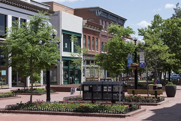Scenic streetscape in lively neighborhood of Alexan Diagonal Crossing Apartments