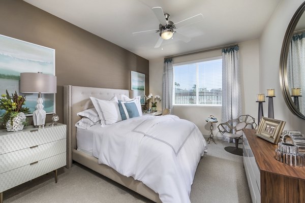Cozy bedroom with modern decor at Areum Apartments, a luxurious living space in the heart of the city