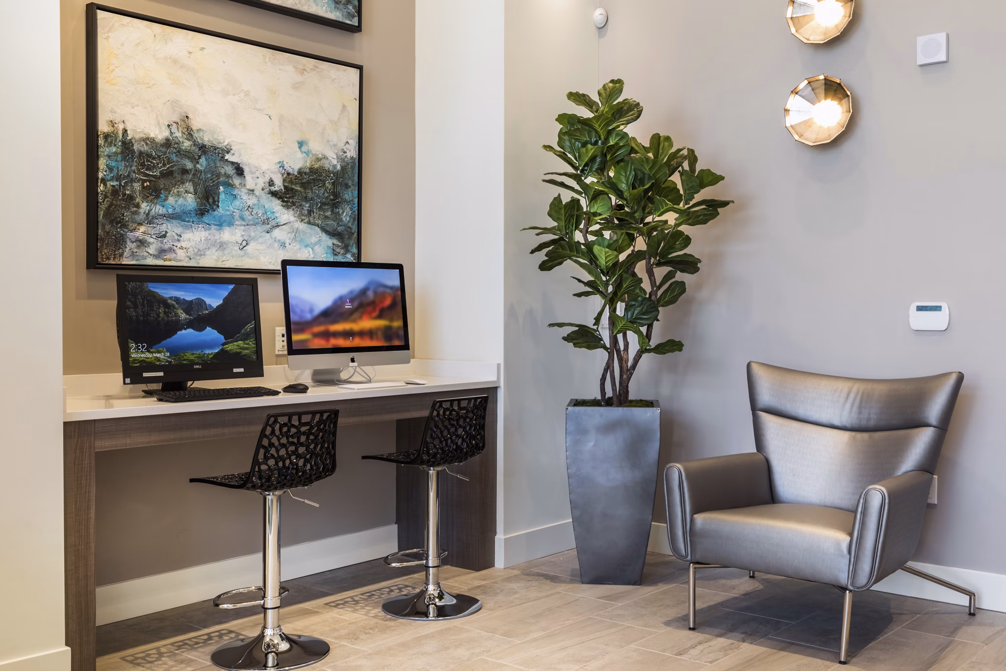 Modern business center with advanced workstations at Areum Apartments, ideal for remote work and collaboration in a luxury setting