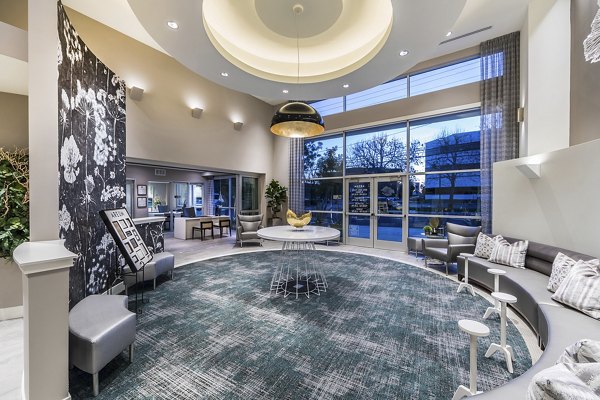 Modern clubhouse featuring luxurious seating and vibrant decor at Areum Apartments