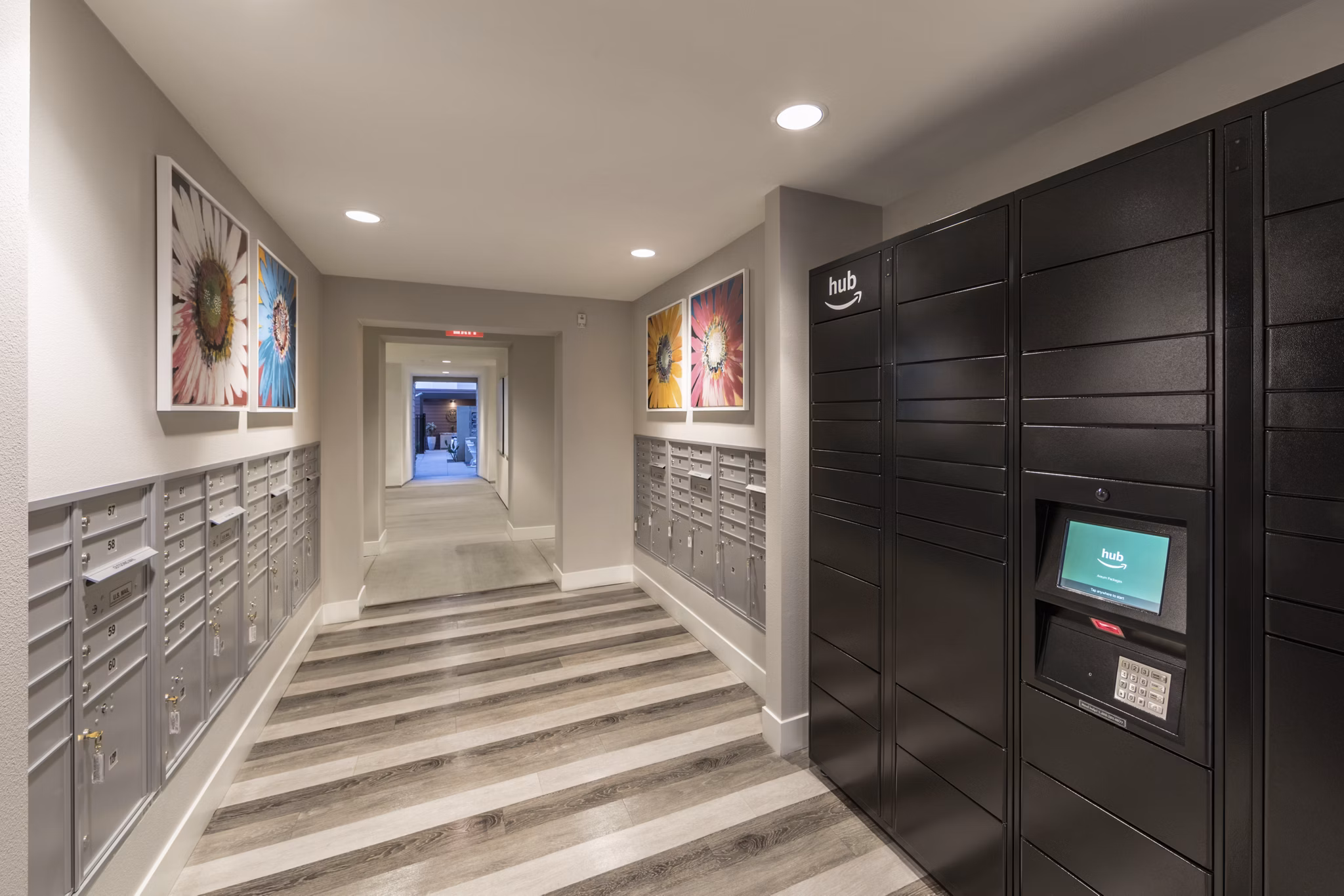 Modern mail room with secure package lockers at Areum Apartments