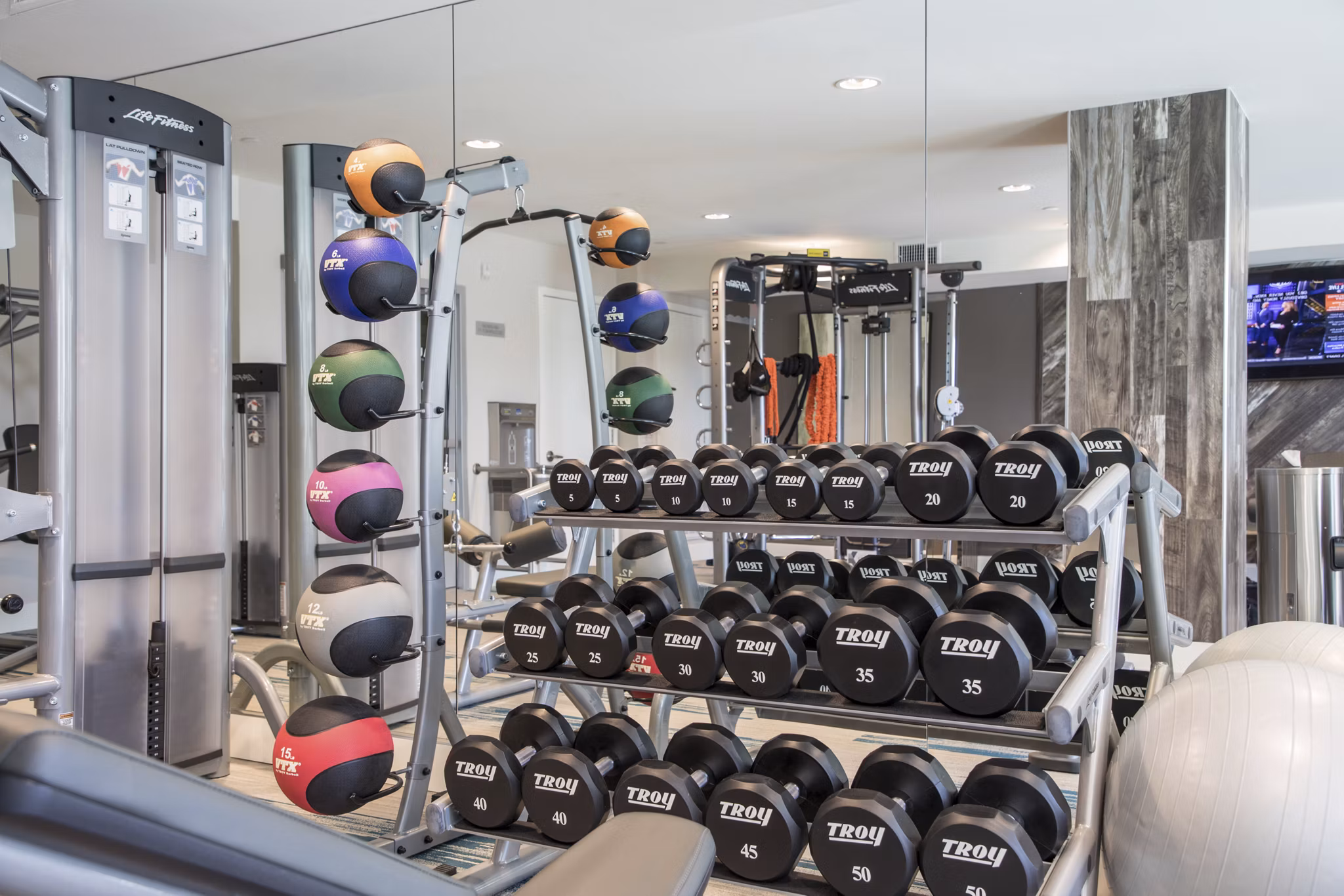 Modern fitness center with state-of-the-art equipment at Areum Apartments for luxury living