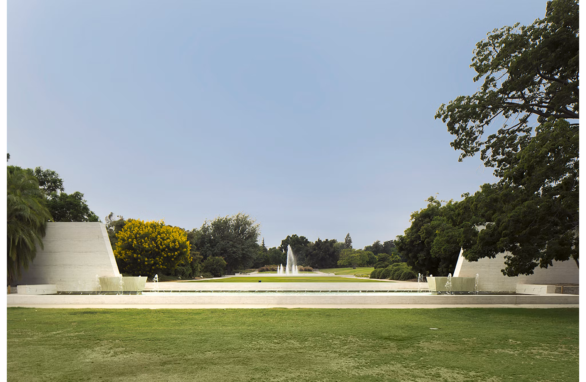 Scenic neighborhood view near Areum Apartments: tree-lined streets and local shops enhance the luxury living experience