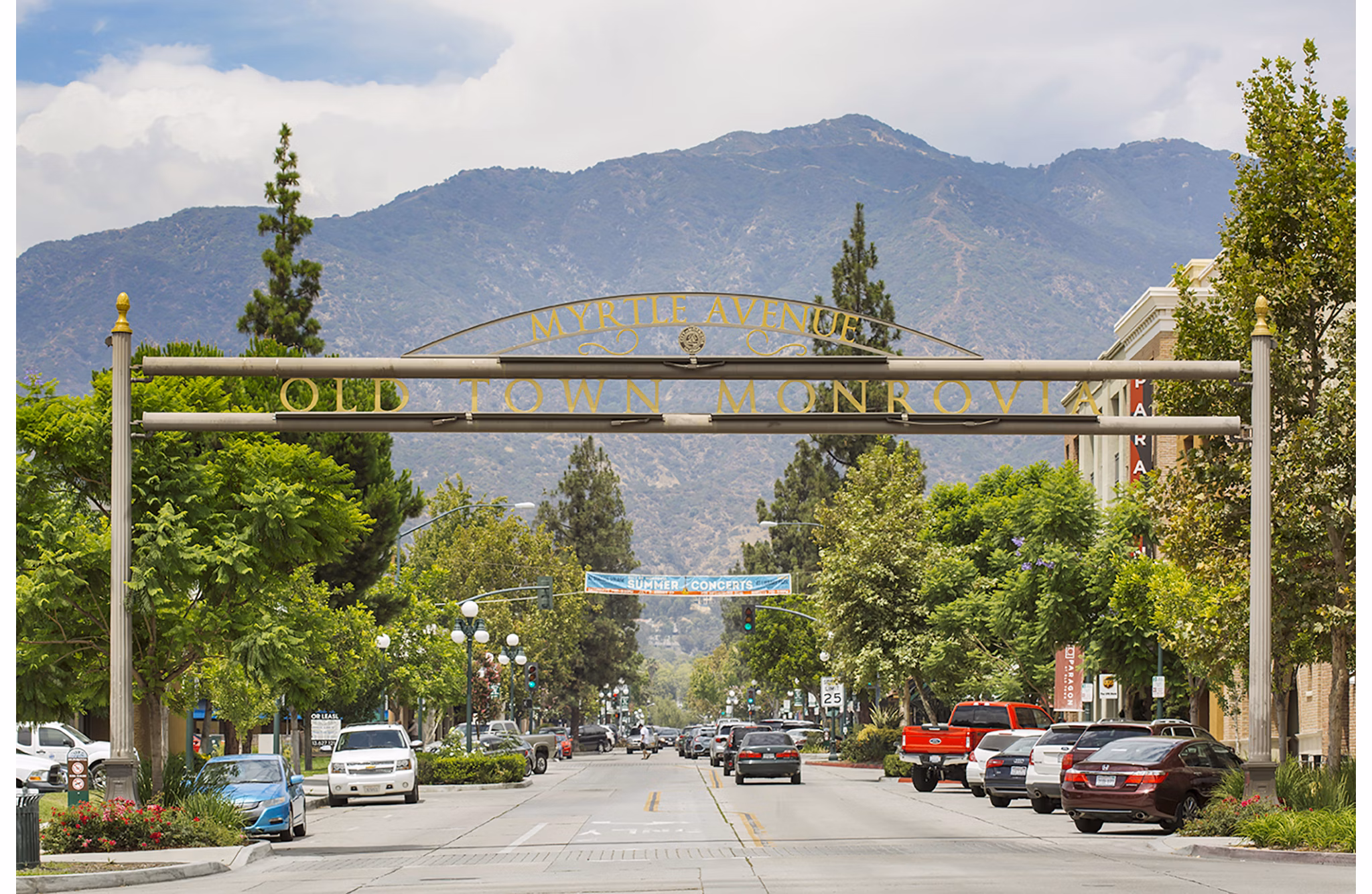 Vibrant neighborhood scene near Areum Apartments with local shops and cafes