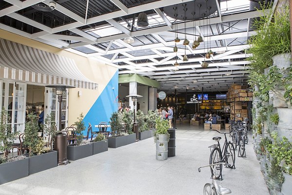 Areum Apartments: Vibrant urban neighborhood view with landscaped walkways and community spaces