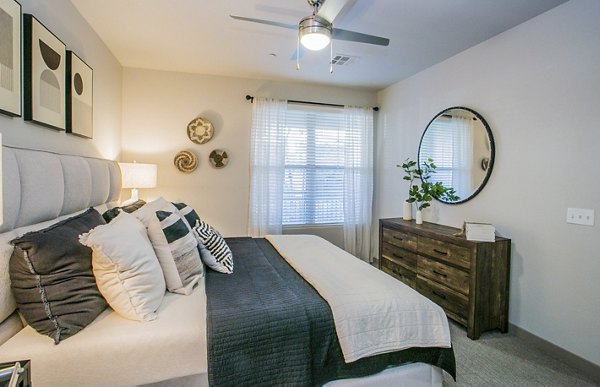 Modern bedroom with elegant furnishings at Volare Apartments