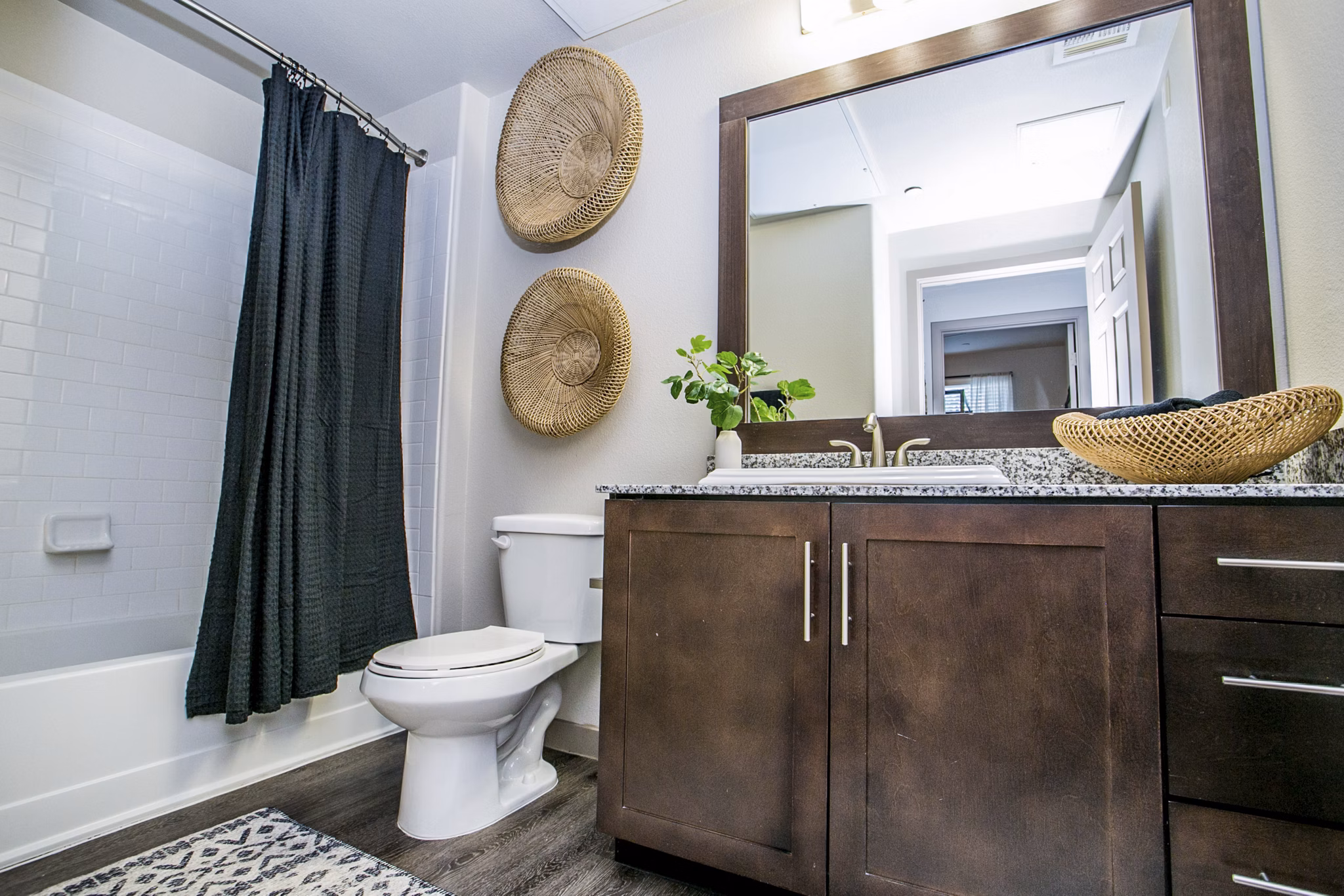 Luxurious bathroom with modern fixtures at Volare Apartments