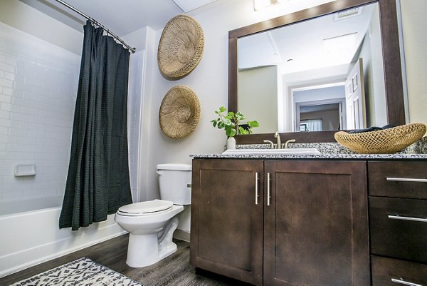Luxurious bathroom with modern fixtures at Volare Apartments