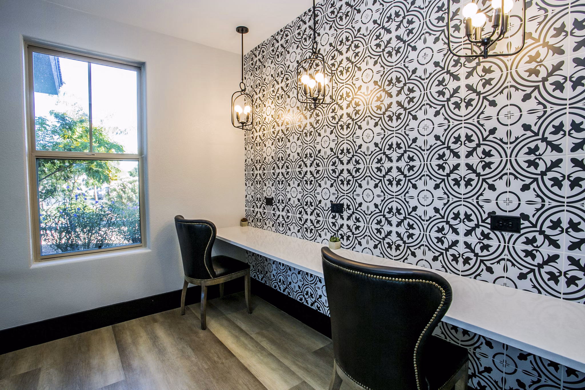 Modern business center with collaborative workspaces at Volare Apartments, ideal for productivity and networking in a luxury setting