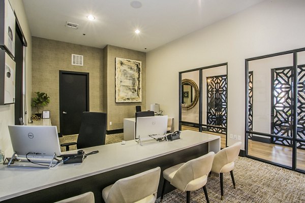Volare Apartments: Modern clubhouse featuring luxurious seating and design elements at Greystar's Volare Apartments in Carlsbad, CA