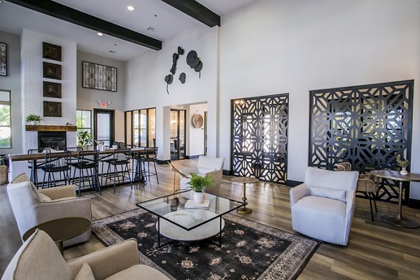 Clubhouse with modern dÃ©cor and cozy seating at Volare Apartments