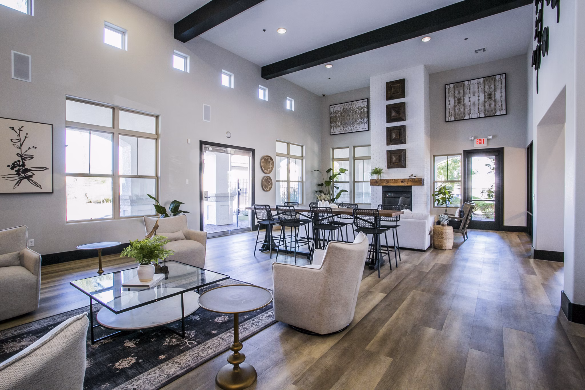 Contemporary clubhouse featuring modern decor and seating areas at Volare Apartments