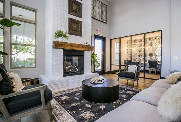 Modern clubhouse at Volare Apartments: Stylish design with cozy seating and ample space for gatherings in luxury apartment community