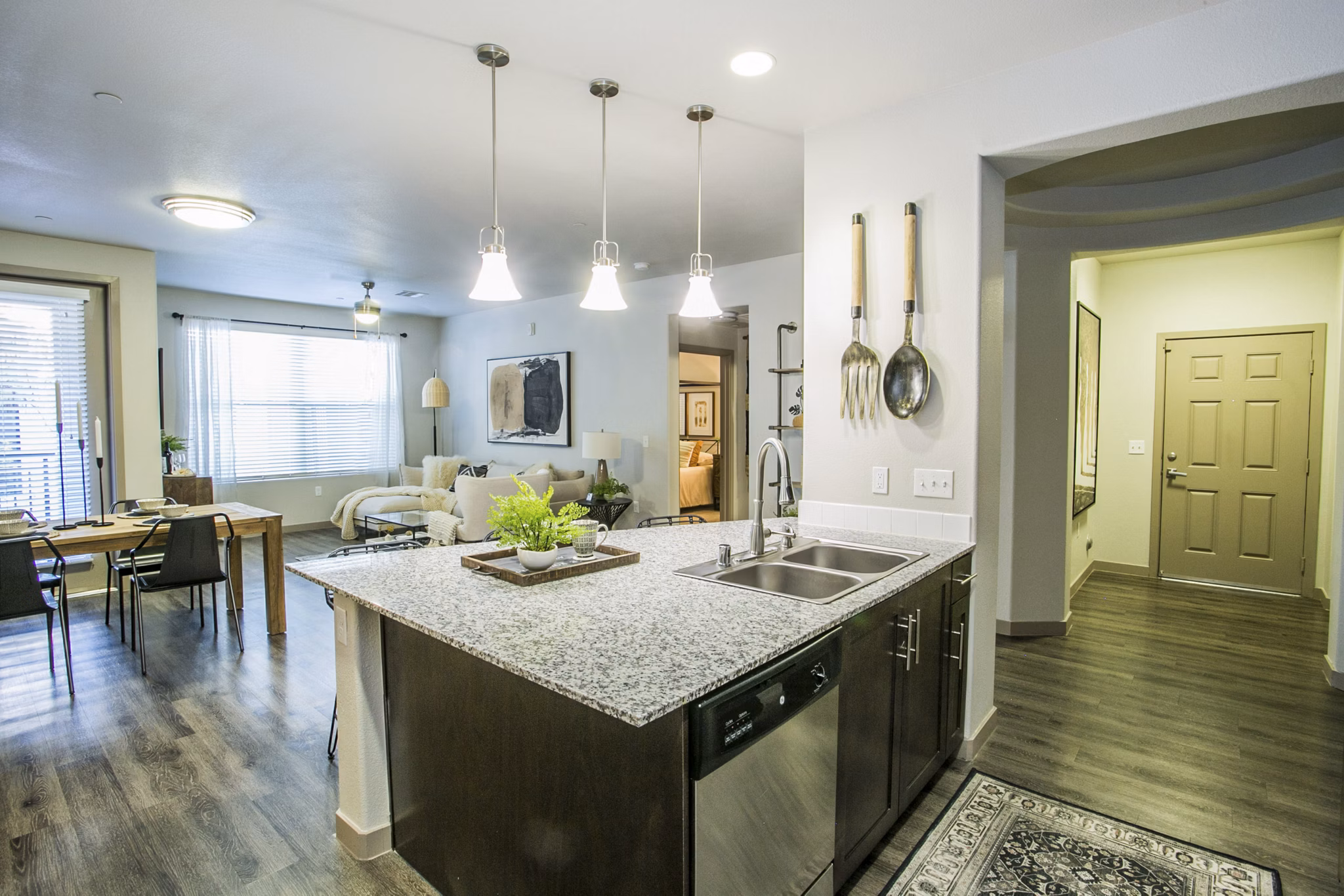 Modern kitchen with stainless steel appliances at Volare Apartments
