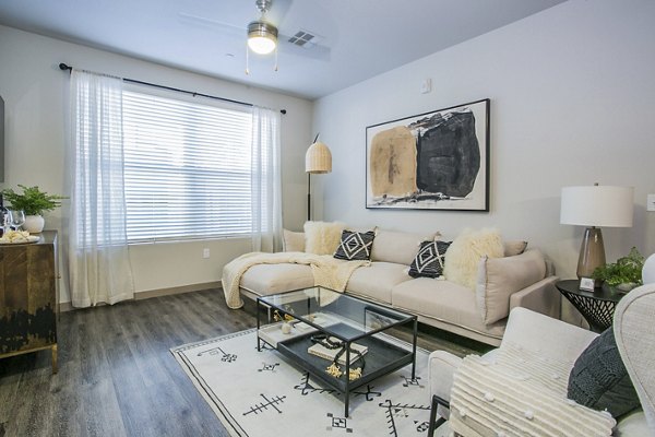 Contemporary living room with stylish furnishings at Volare Apartments