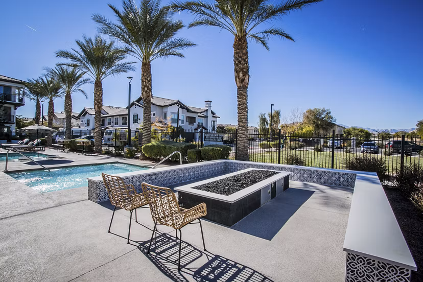 Spacious patio with outdoor seating at Volare Apartments, perfect for luxury living