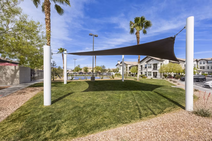 Outdoor grill area with modern seating at Volare Apartments, perfect for entertaining and relaxation