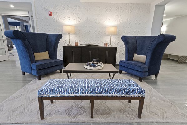 Clubhouse featuring modern amenities and stylish interiors at The Quincy Apartments