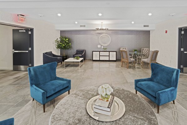 Lobby featuring modern decor and seating at The Quincy Apartments