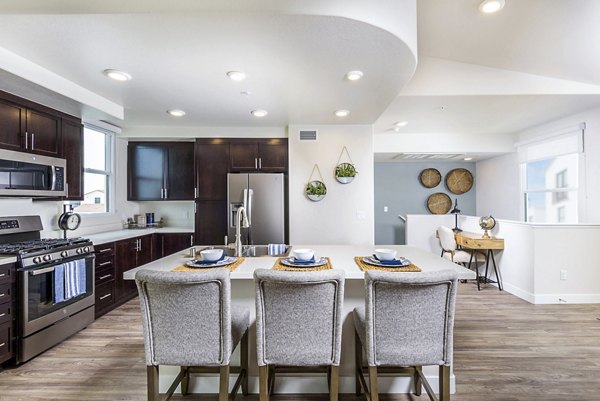 Elegant dining room with modern decor at Portside Ventura Harbor Apartments