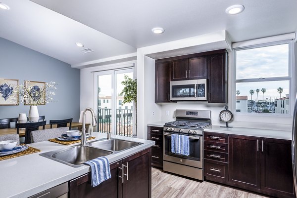 Spacious kitchen with modern appliances at Portside Ventura Harbor Apartments