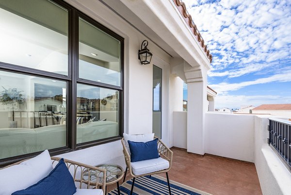 Patio with ocean views at Portside Ventura Harbor Apartments, perfect for outdoor relaxation and dining in a luxury setting