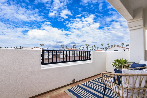 Scenic patio with harbor views at Portside Ventura Harbor Apartments