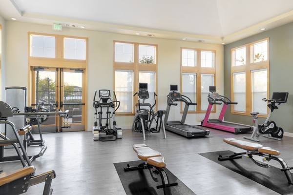 fitness center at Greens at Van de Water Apartments