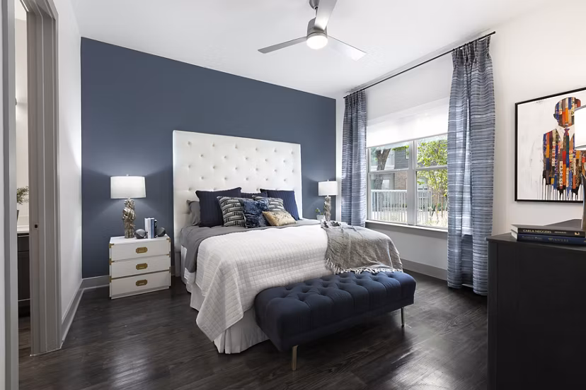 Contemporary bedroom with modern decor at Atlas Waterside Apartments