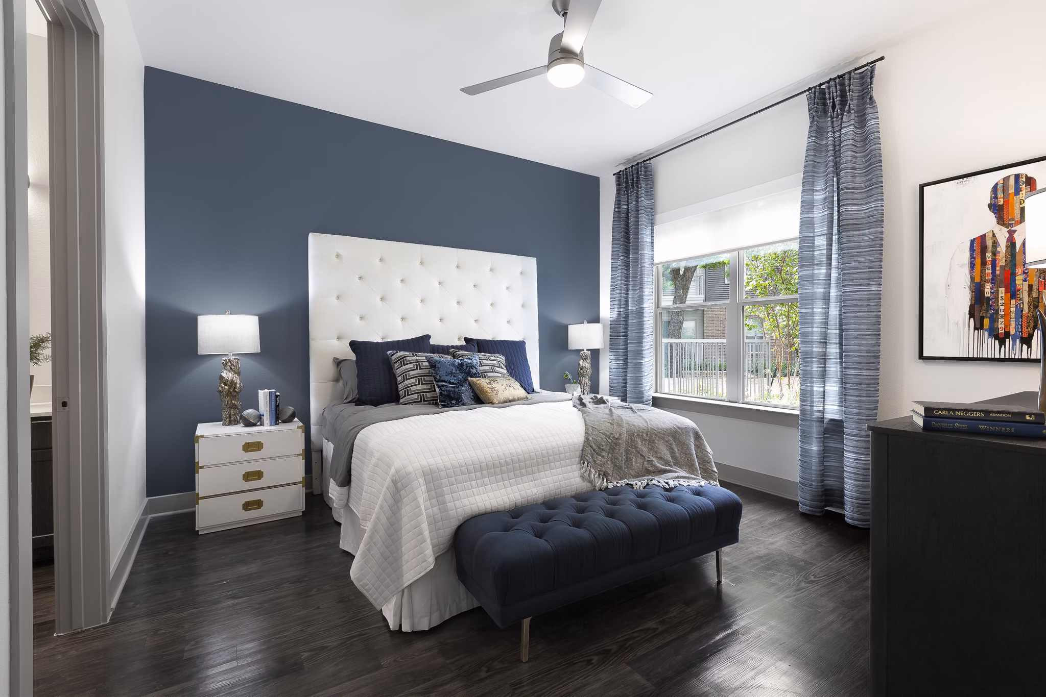 Contemporary bedroom with modern decor at Atlas Waterside Apartments