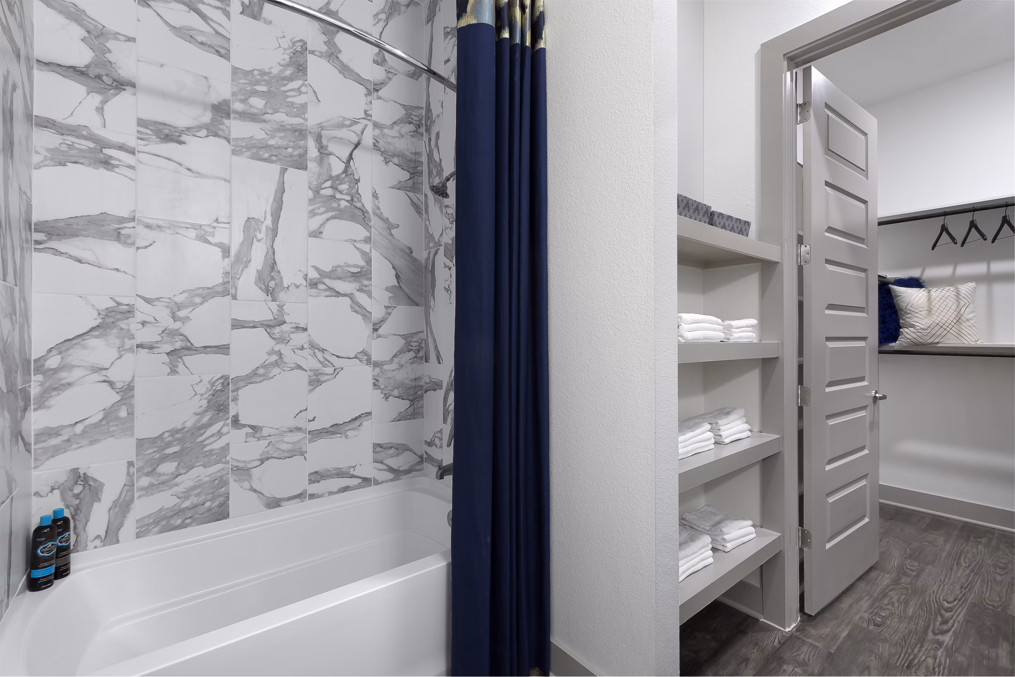 Sleek bathroom with modern fixtures at Atlas Waterside Apartments offering luxury living