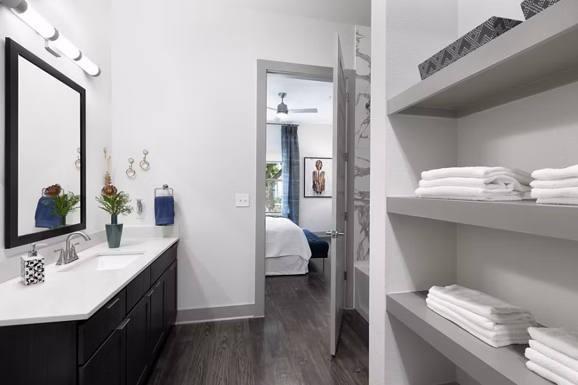 Modern bathroom with sleek fixtures in Atlas Waterside Apartments in Fort Worth, designed for luxury and comfort