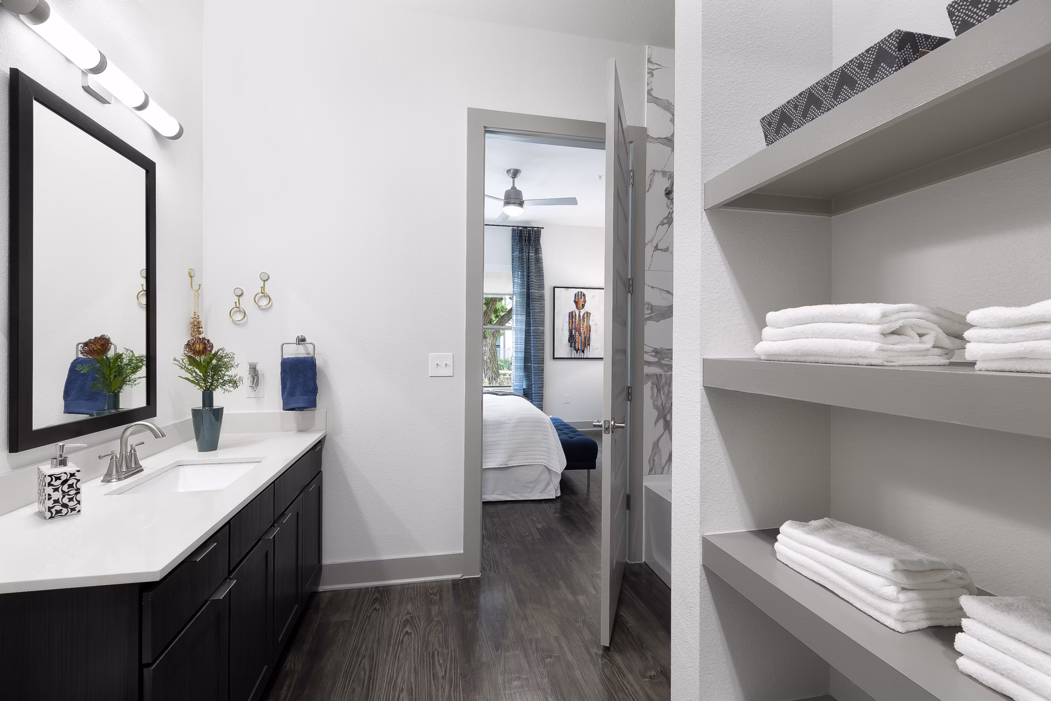 Modern bathroom with sleek fixtures in Atlas Waterside Apartments in Fort Worth, designed for luxury and comfort