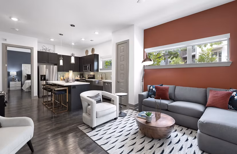 Spacious living room with modern decor at Atlas Waterside Apartments