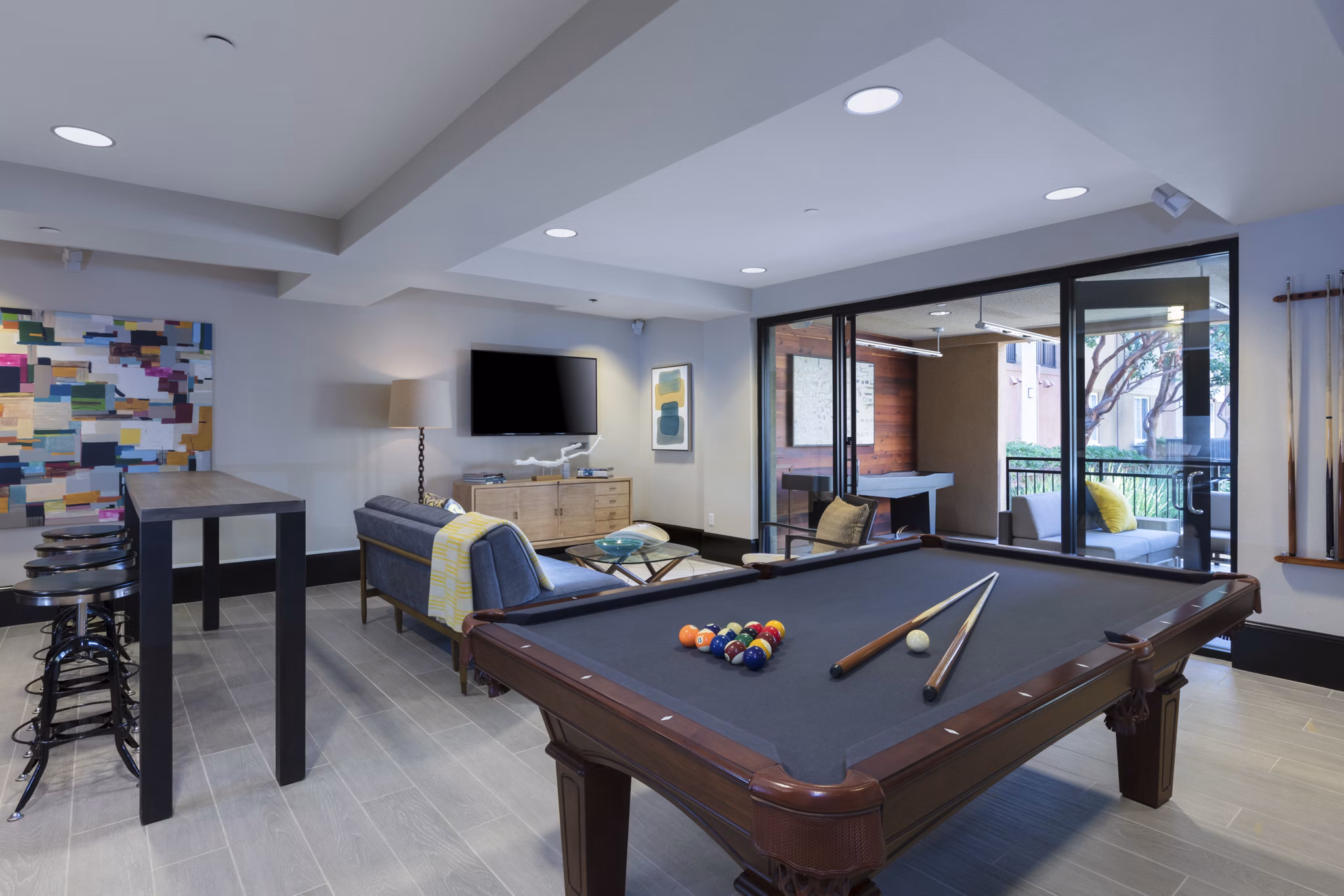 Billiards room with modern decor at Tamarind Square luxury apartments