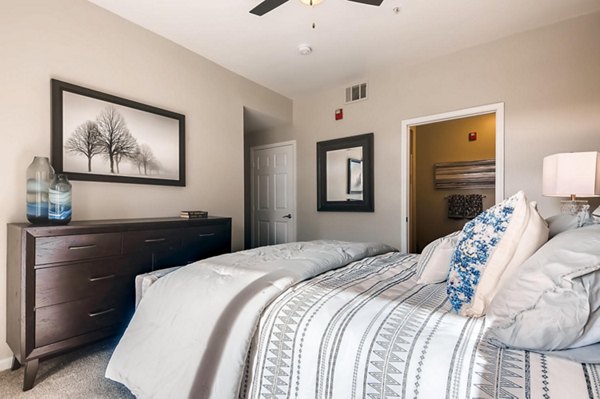 Modern bedroom with stylish decor in Lowry Park Apartments
