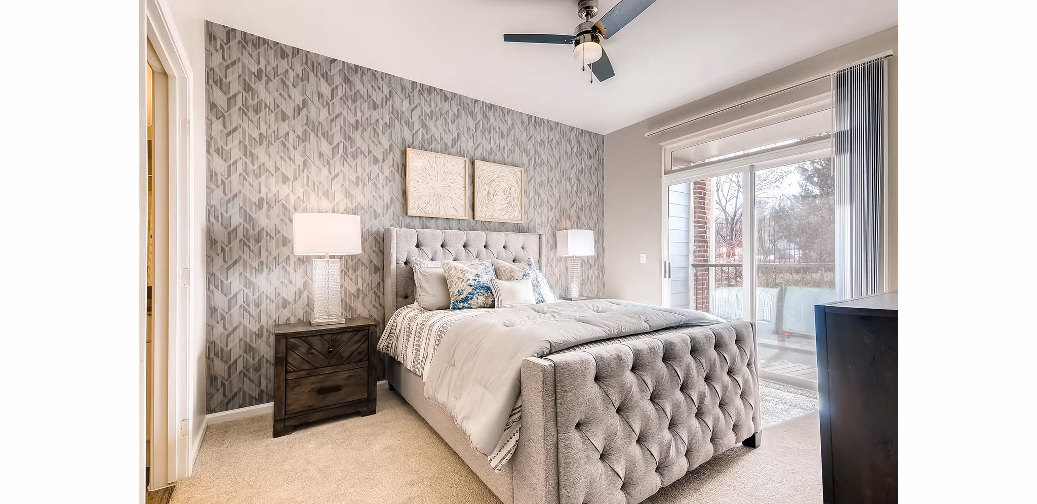 Cozy bedroom with modern decor at Lowry Park Apartments