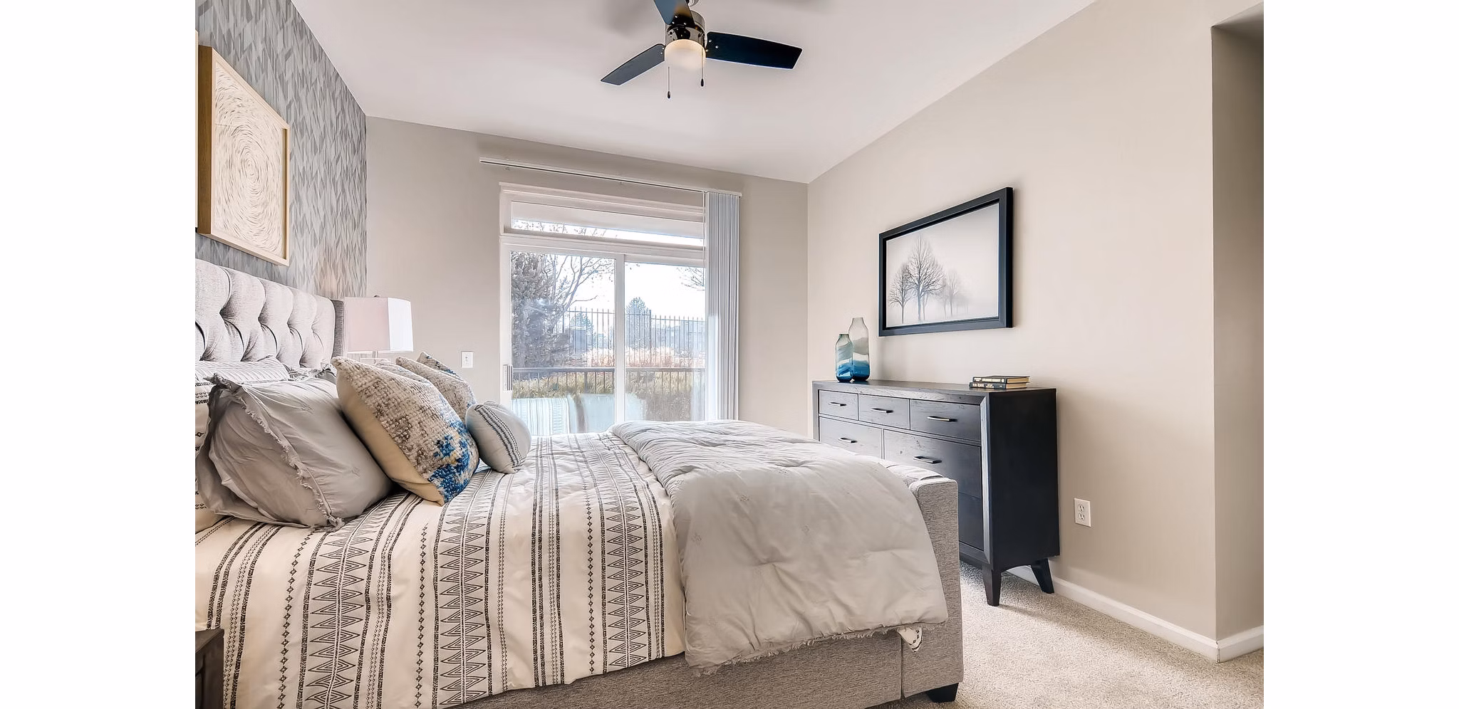 Cozy bedroom with elegant decor at Lowry Park Apartments