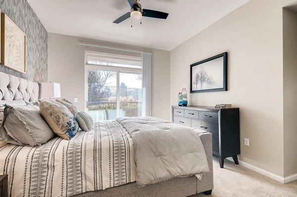 Cozy bedroom with elegant decor at Lowry Park Apartments