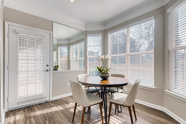 Dining area with modern furnishings at Lowry Park Apartments