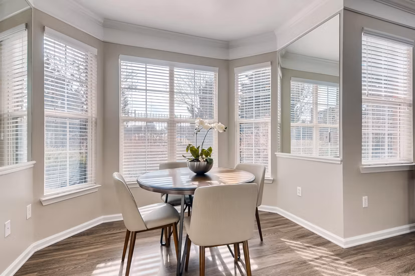 Dining room with elegant lighting and modern decor at Lowry Park Apartments