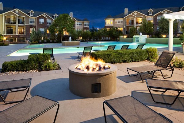 Cozy recreational area with firepit at Lowry Park Apartments