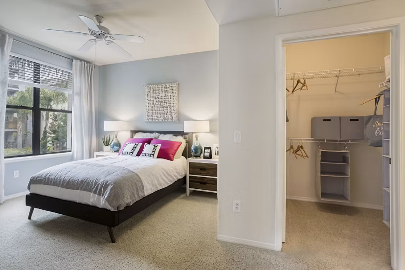 Bedroom featuring modern decor and natural light at City Place Apartments