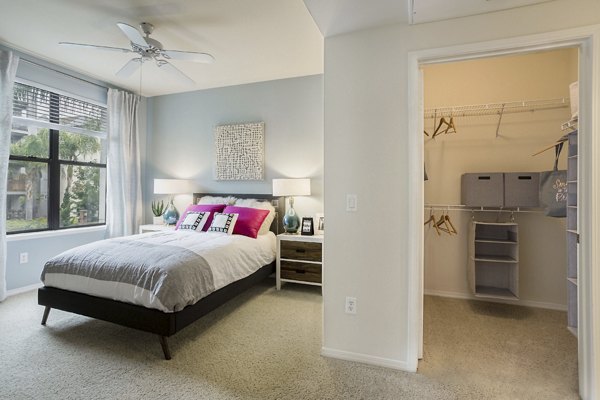 Bedroom featuring modern decor and natural light at City Place Apartments